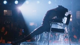 The scene would be nowt with the chair taken out: Flashdance